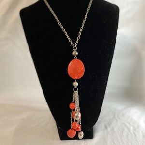 Orange necklace with matching earrings